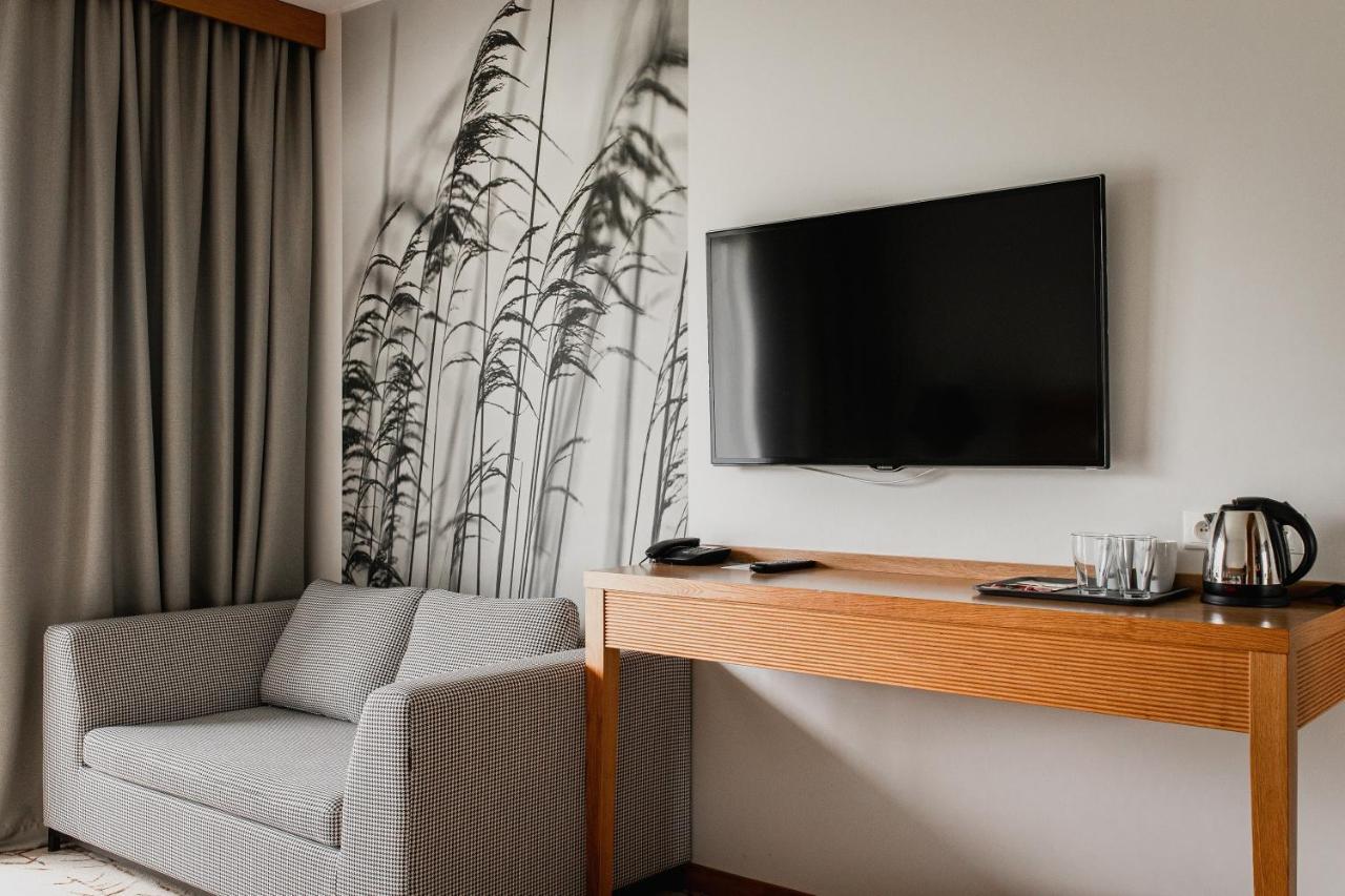 Hotel Marina Club Olsztyn  Exterior foto A television in a hotel room